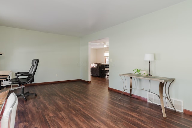 office space with dark hardwood / wood-style floors