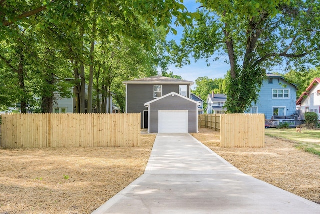 view of front facade with a garage and an outdoor structure