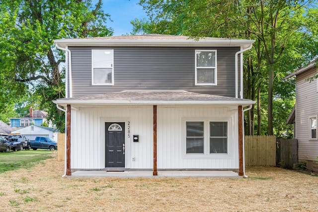 front facade with a front yard