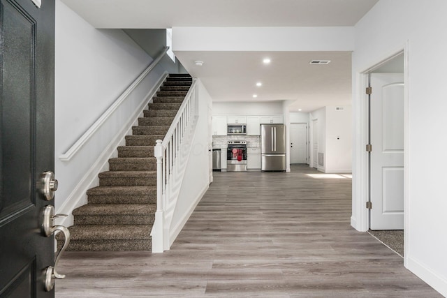 entryway featuring light hardwood / wood-style floors