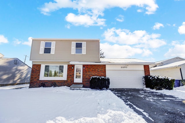 view of front property with a garage