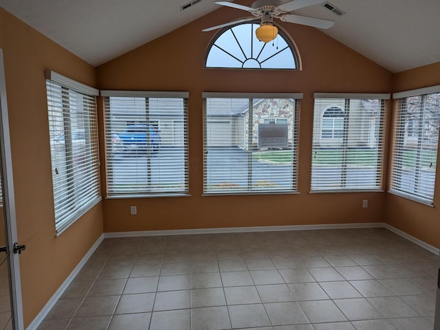 unfurnished sunroom featuring ceiling fan and lofted ceiling