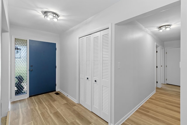 foyer entrance featuring light hardwood / wood-style floors