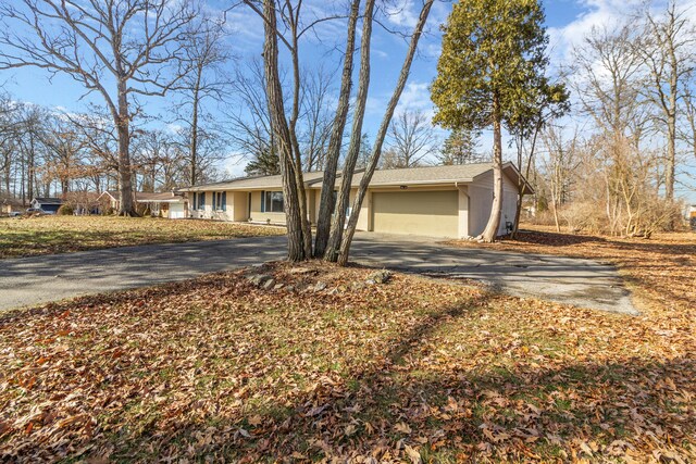 ranch-style house with a garage