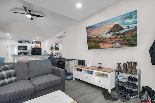 living room featuring ceiling fan, dark hardwood / wood-style flooring, lofted ceiling, and an AC wall unit