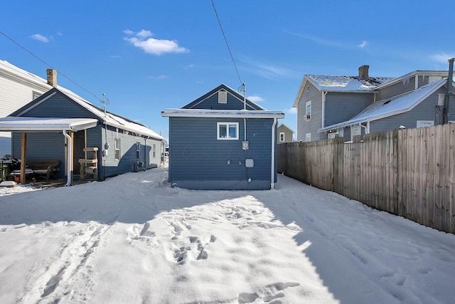 view of snow covered property