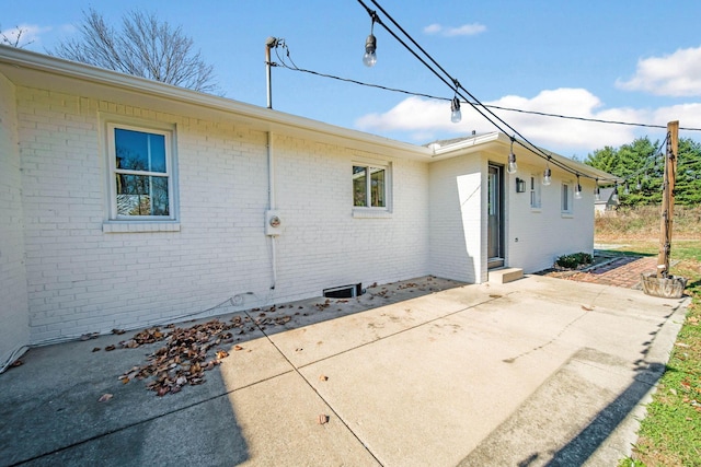 rear view of property with a patio area