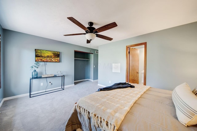 bedroom featuring carpet, ceiling fan, and a closet