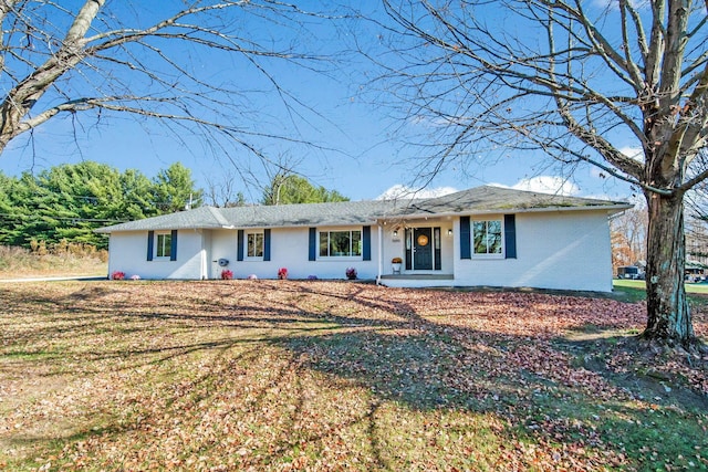 single story home with a front yard