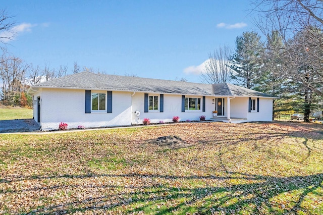 ranch-style house with a front lawn