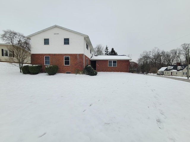 view of snow covered property