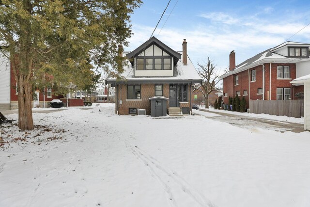 view of snow covered house