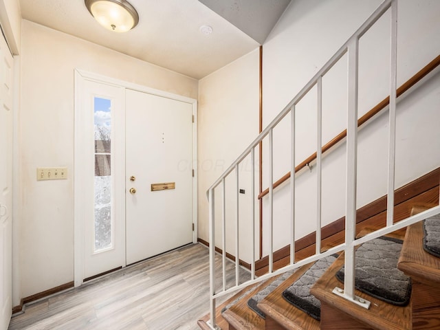 entrance foyer with light hardwood / wood-style floors