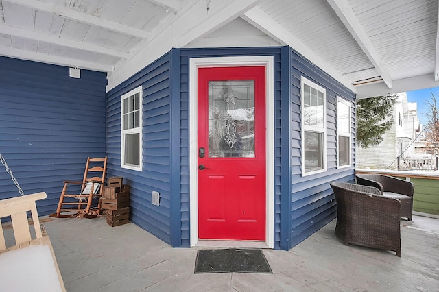 entrance to property with covered porch