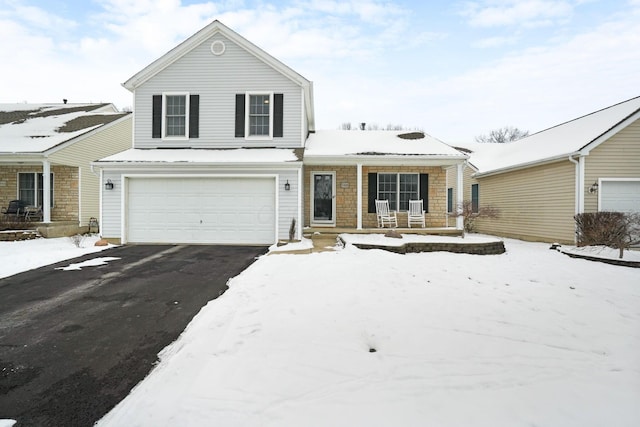 view of front of property featuring a garage