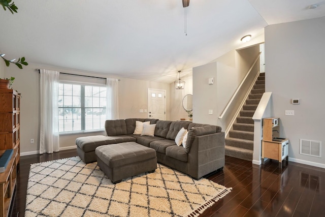 living room with dark wood-type flooring