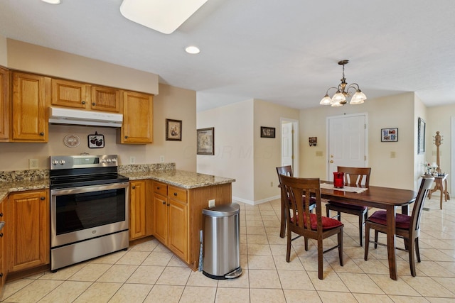 kitchen with electric range, decorative light fixtures, light stone counters, kitchen peninsula, and a chandelier