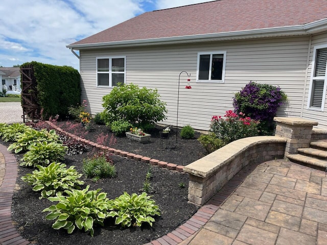 view of home's exterior featuring a patio area