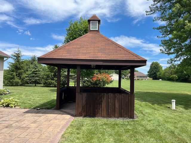 view of community featuring a gazebo and a lawn