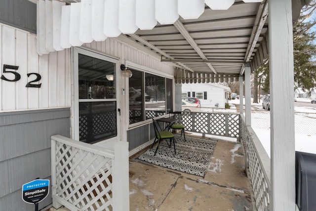 view of snow covered patio