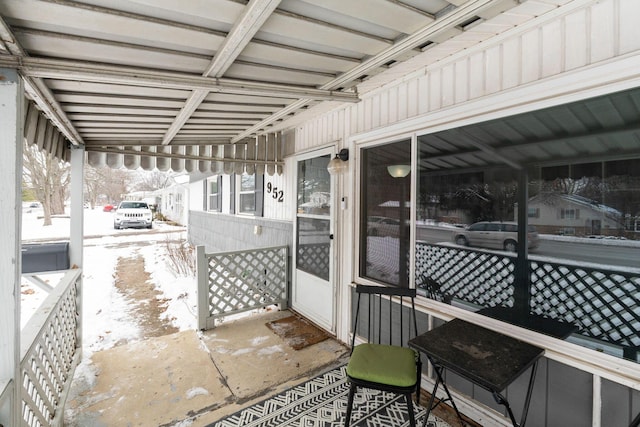 view of snow covered patio