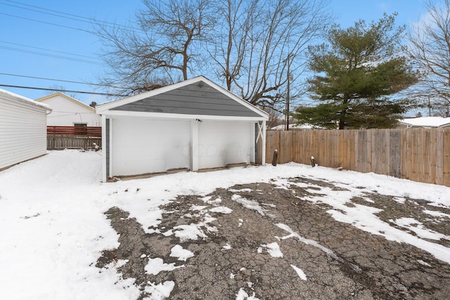 view of snow covered garage