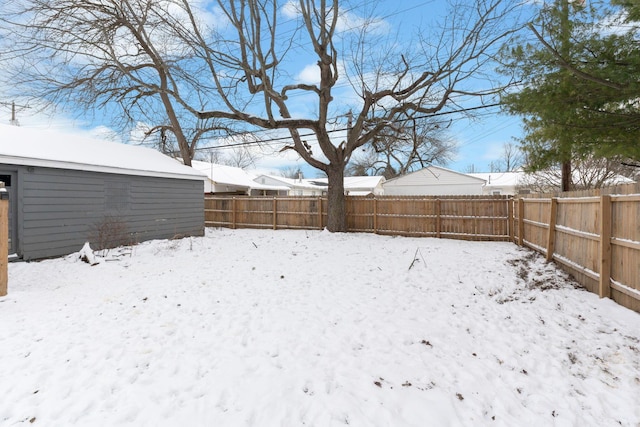 view of yard covered in snow