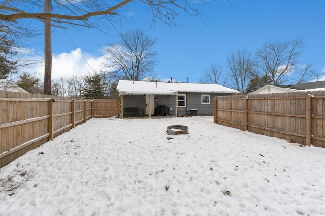 view of snow covered house