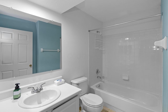 full bathroom featuring bathing tub / shower combination, vanity, and toilet