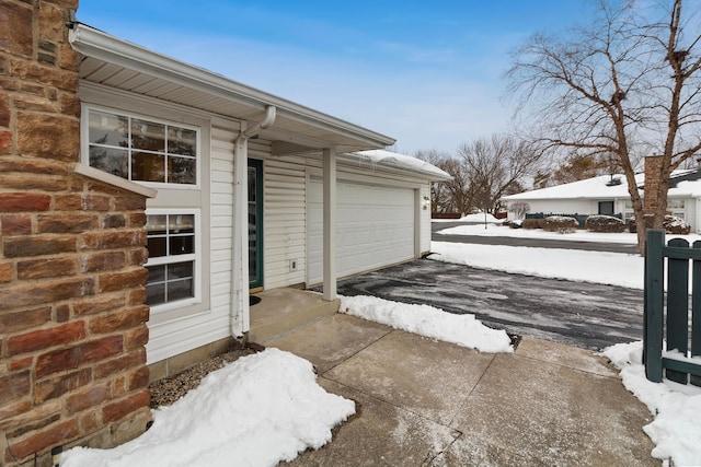 exterior space with a garage