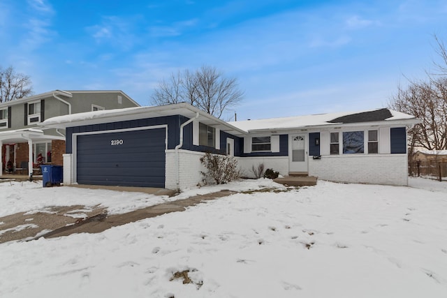 single story home with a garage