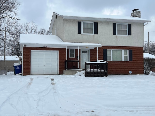 view of front property with a garage