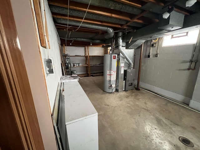 basement featuring heating unit and gas water heater