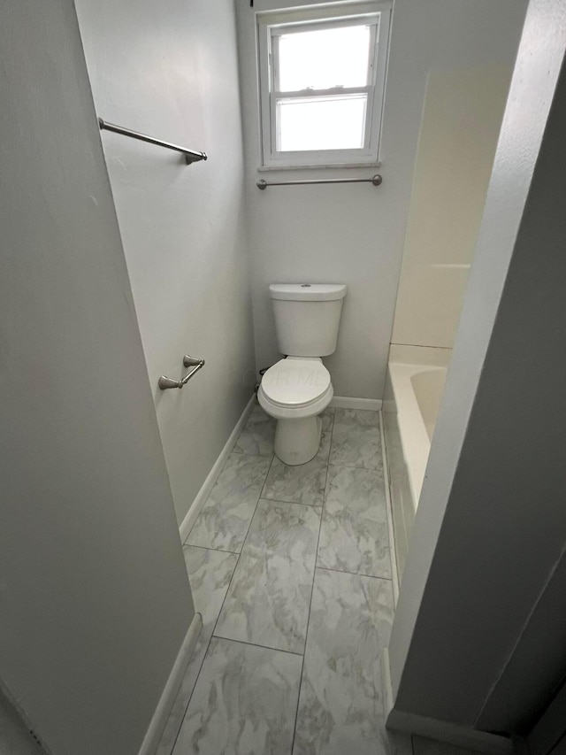 bathroom featuring toilet