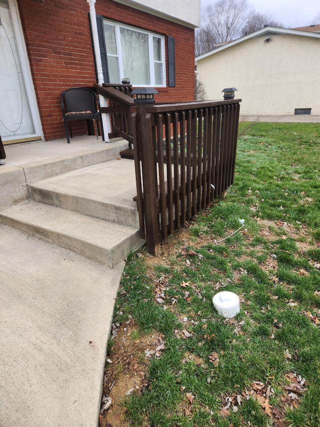 wooden deck with a yard