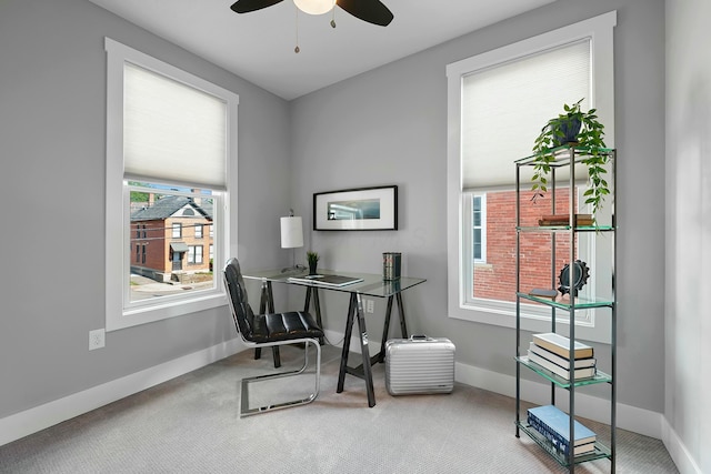 office with ceiling fan and carpet floors