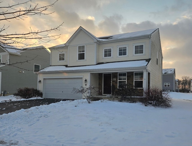 view of front of property featuring a garage