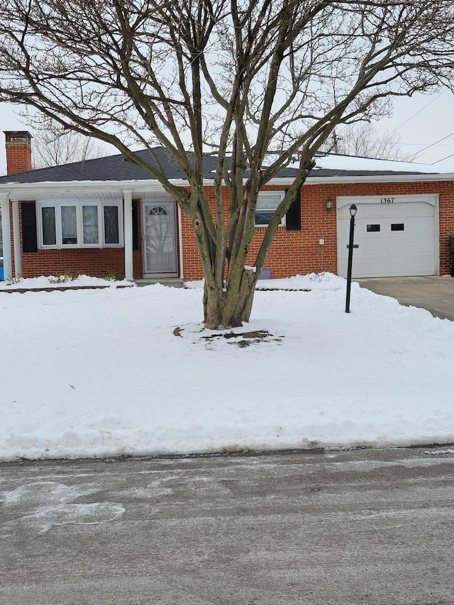 single story home featuring a garage