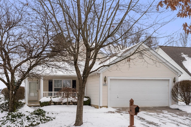 ranch-style house with covered porch and an attached garage