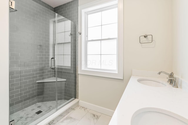 bathroom with vanity and an enclosed shower