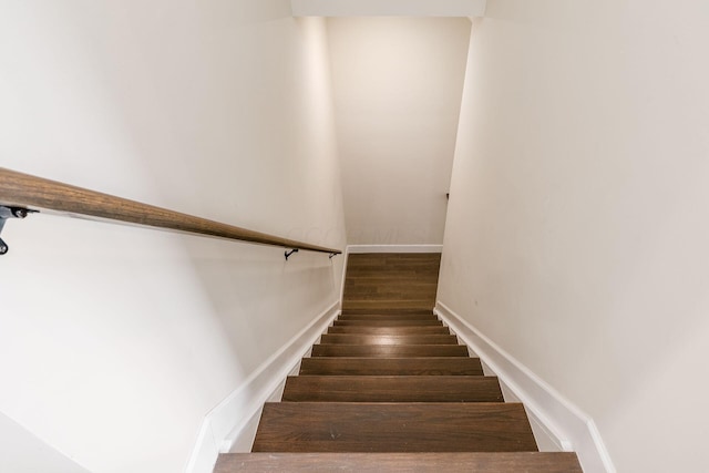 2015 W 5th Ave Unit 211, Columbus, OH 43212 - staircase with hardwood / wood-style floors