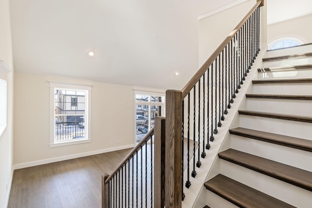2015 W 5th Ave Unit 211, Columbus, OH 43212 - staircase with hardwood / wood-style floors and a healthy amount of sunlight