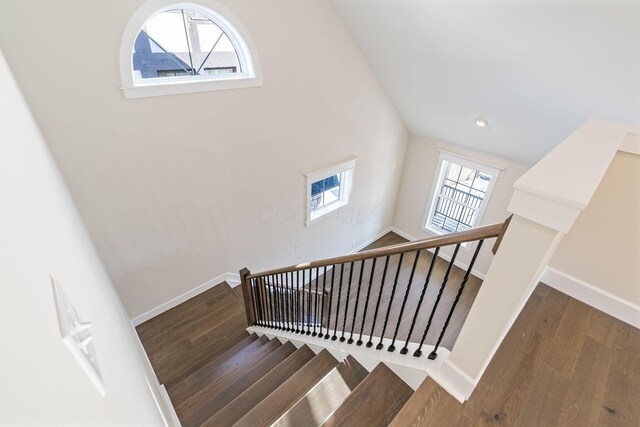 2015 W 5th Ave Unit 211, Columbus, OH 43212 - staircase with hardwood / wood-style flooring