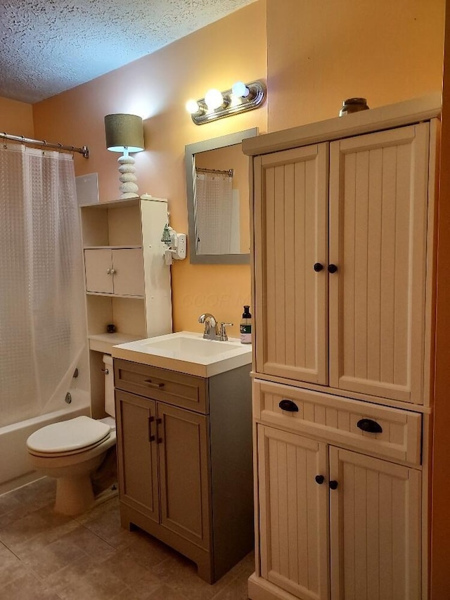 full bathroom featuring a textured ceiling, toilet, vanity, and shower / tub combo with curtain