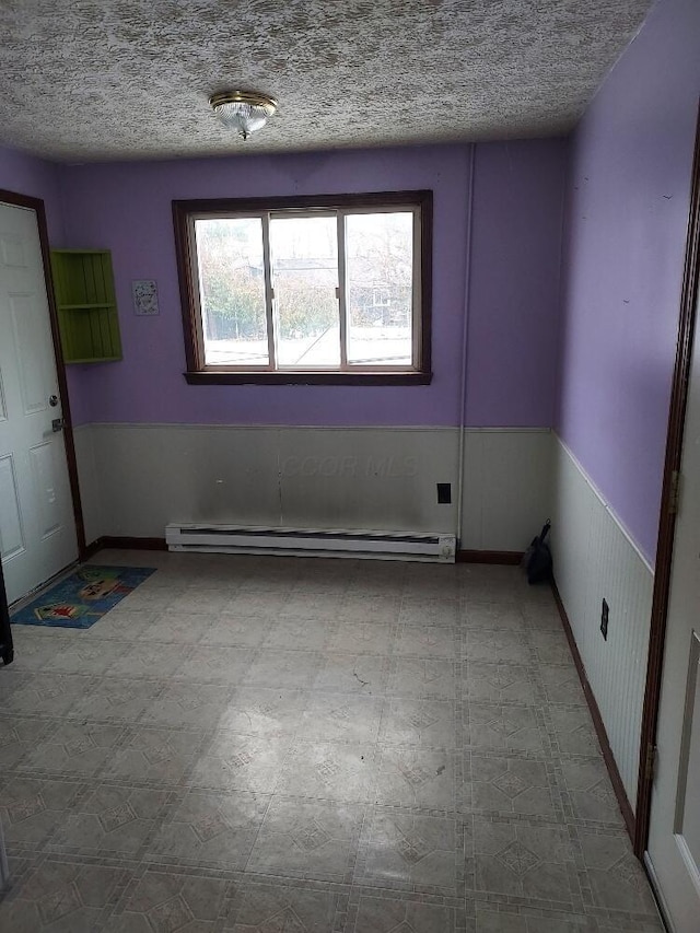 empty room with a baseboard radiator