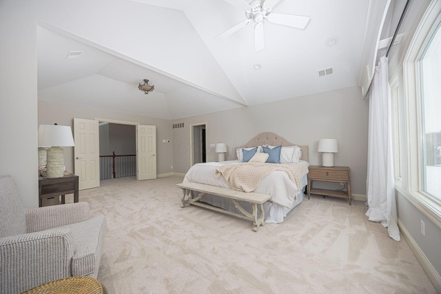 carpeted bedroom featuring ceiling fan and lofted ceiling