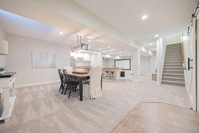 view of carpeted dining area