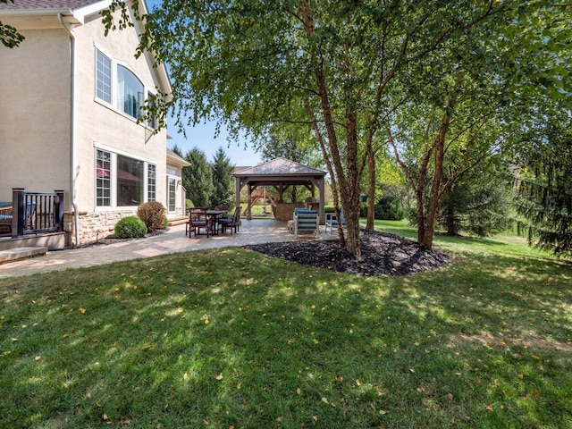 view of yard with a gazebo and a patio area