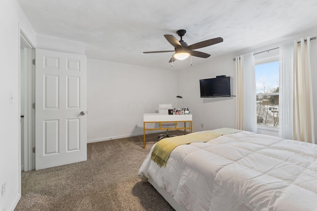 bedroom with ceiling fan and carpet floors