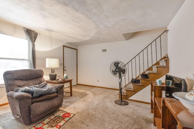 sitting room with light colored carpet